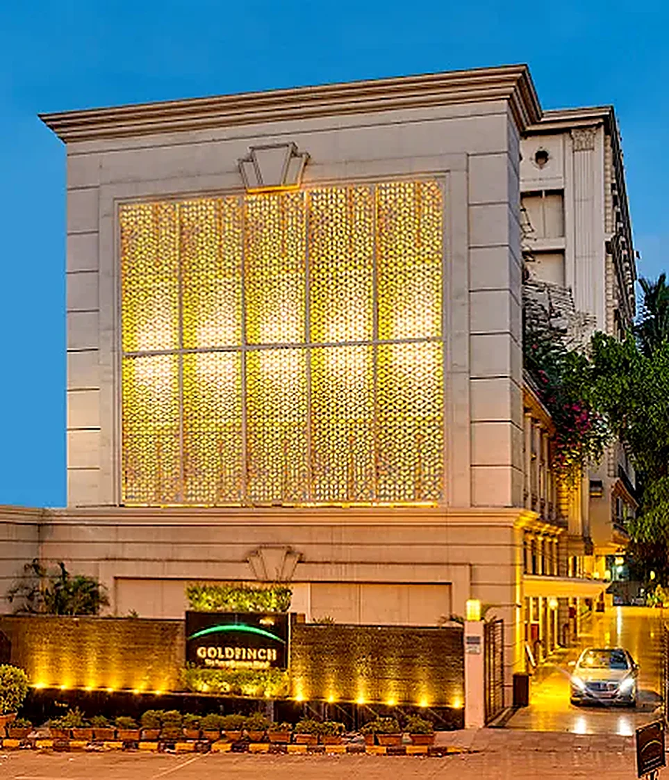 Goldfinch Mumbai hotel facade lit up at dusk