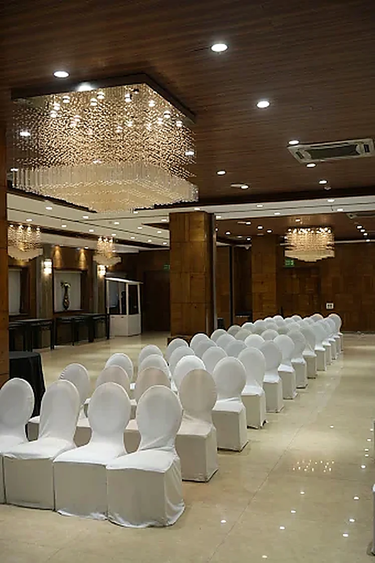 Banquet hall with chandeliers at Goldfinch Mumbai