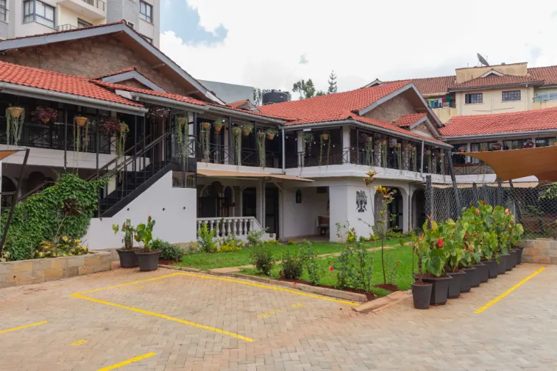 Trisan Resident Hotel building and garden in Kilimani, Nairobi